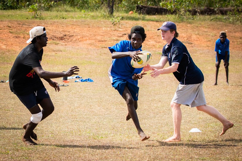 The youngsters at Tiwi College threw themselves into the Touch Footy clinic.