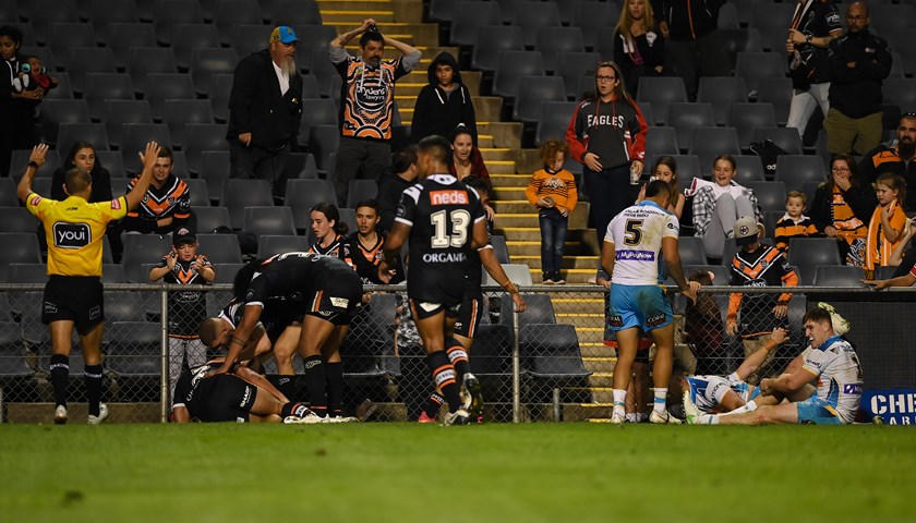 David Nofoaluma on the ground at Campbelltown after  sliding into the fence.