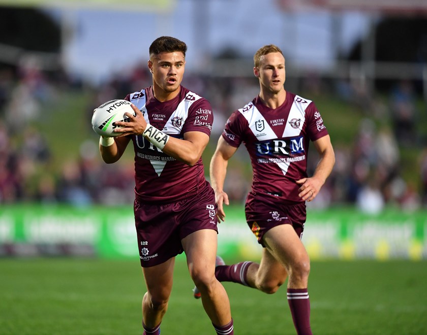 Josh Schuster during his NRL debut in 2020 with Daly Cherry-Evans.