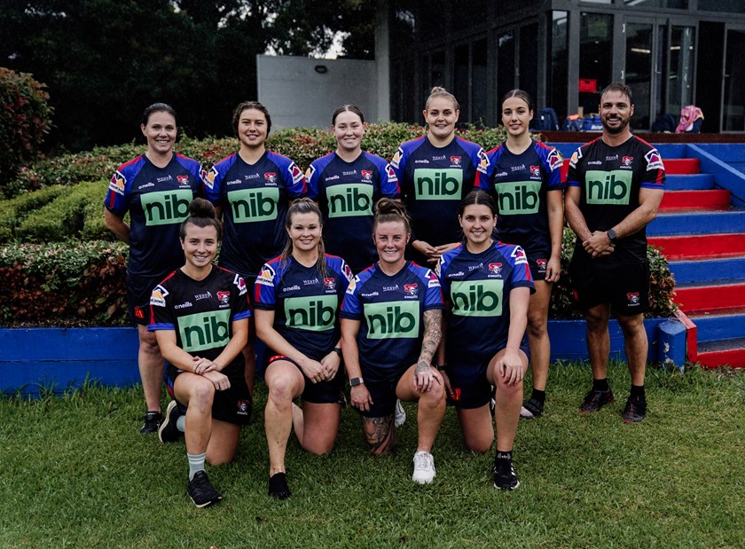 Local members of the Knights' NRLW team with new coach Casey Bromilow.