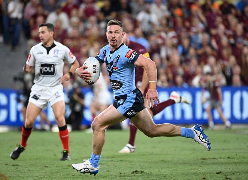 Damien Cook on the move for the Blues in Origin I.