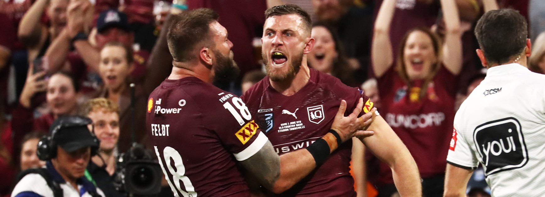 Kurt Capewell celebrates a try for Queensland.