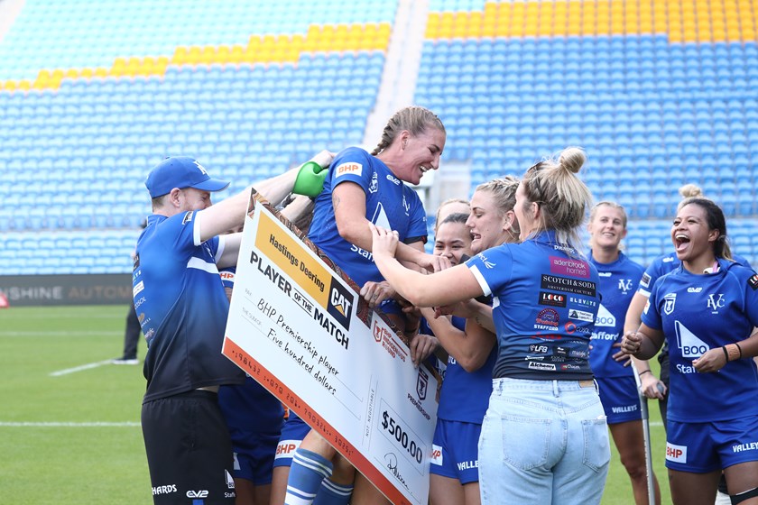 Ali Brigginshaw is mobbed by her Valleys teammates after collecting the player of the match.