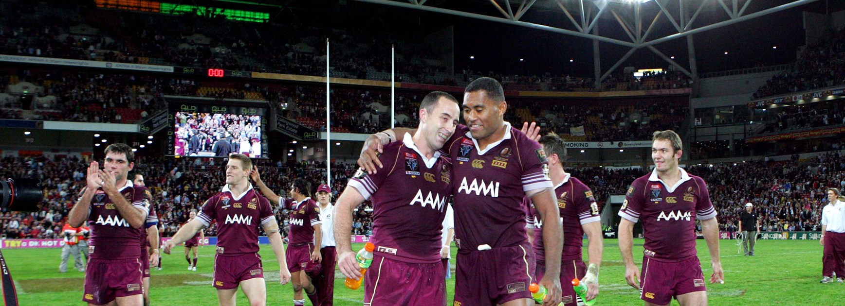 Adam Mogg and Petero Civoniceva celebrate the Maroons win in Game 1, 2006.