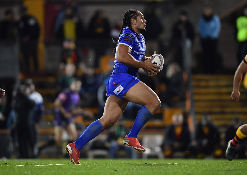 Martin Taupau powers ahead for Samoa.