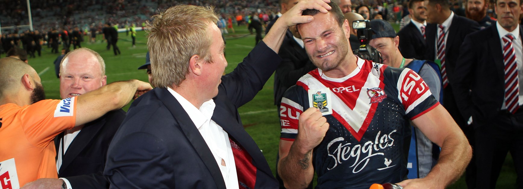 Trent Robinson and Boyd Cordner after the 2013 grand final.