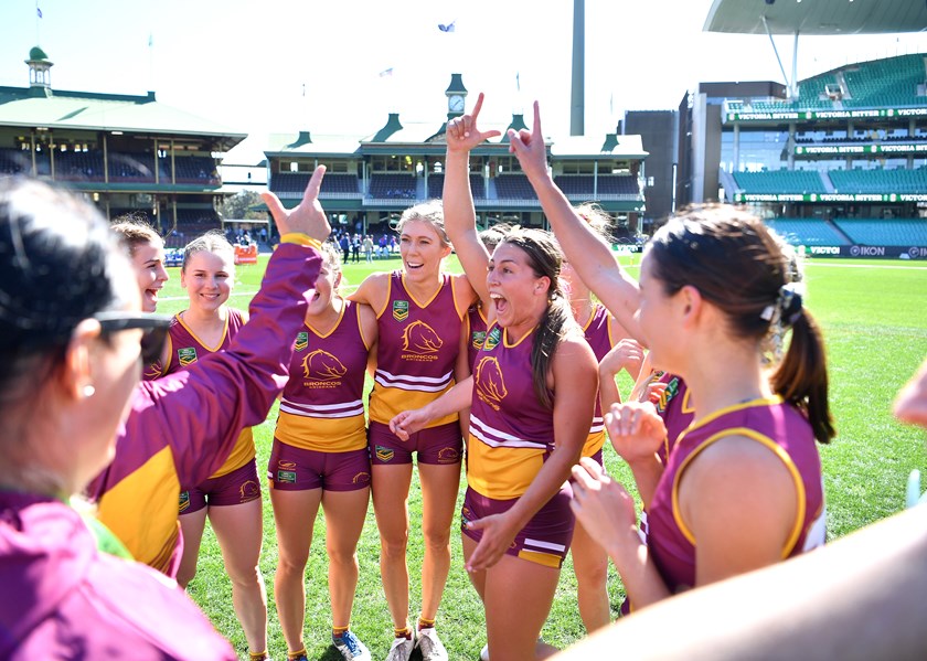 The Broncos celebrate winning the 2019 NRLW Touch title at the SCG.