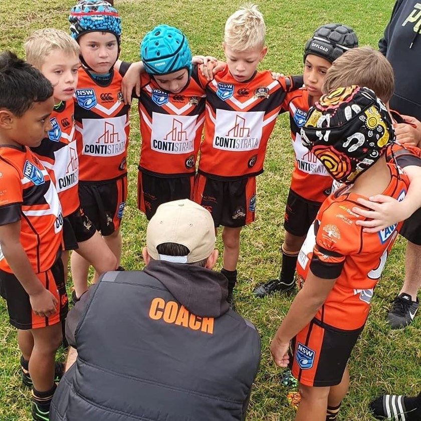 Coach Damian Brauman offers some words of wisdom to the under-7s.