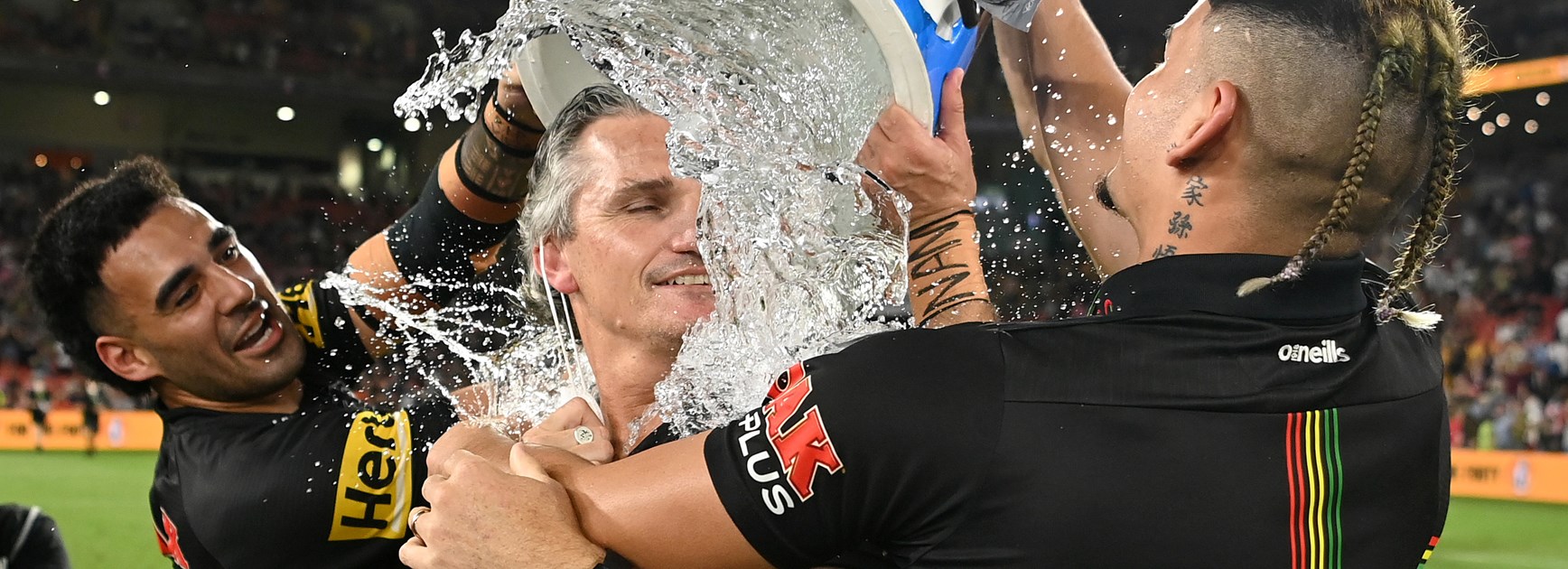 Ivan Cleary gets an unexpected shower after the game.
