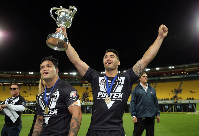Shaun Johnson and Issac Luke celebrate the Kiwis' win over Australia in 2014.