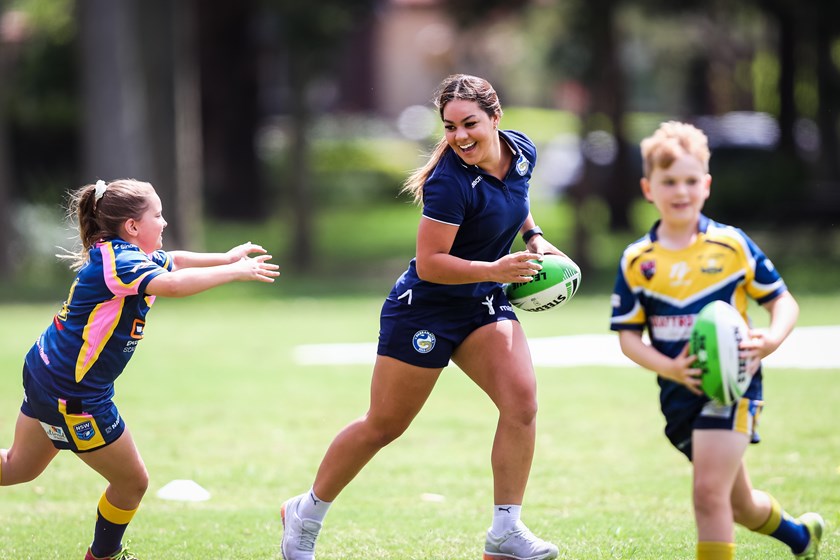 Eels NRLW player Kennedy Cherrington with Willoughby Roos juniors.
