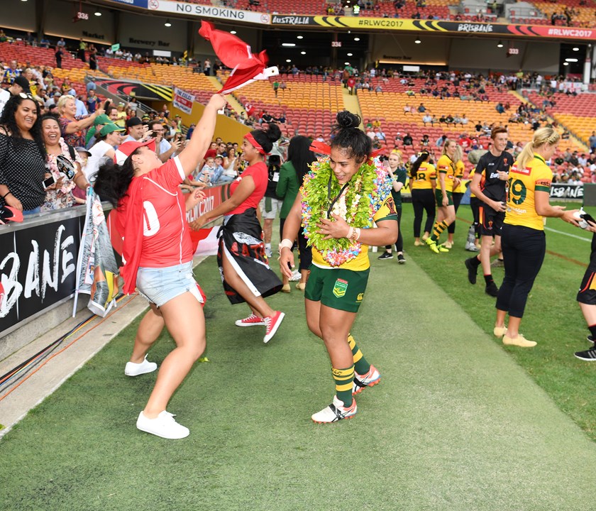 Simaima Taufa is greeted by her Tongan relatives following Australia's World Cup win in 2017.