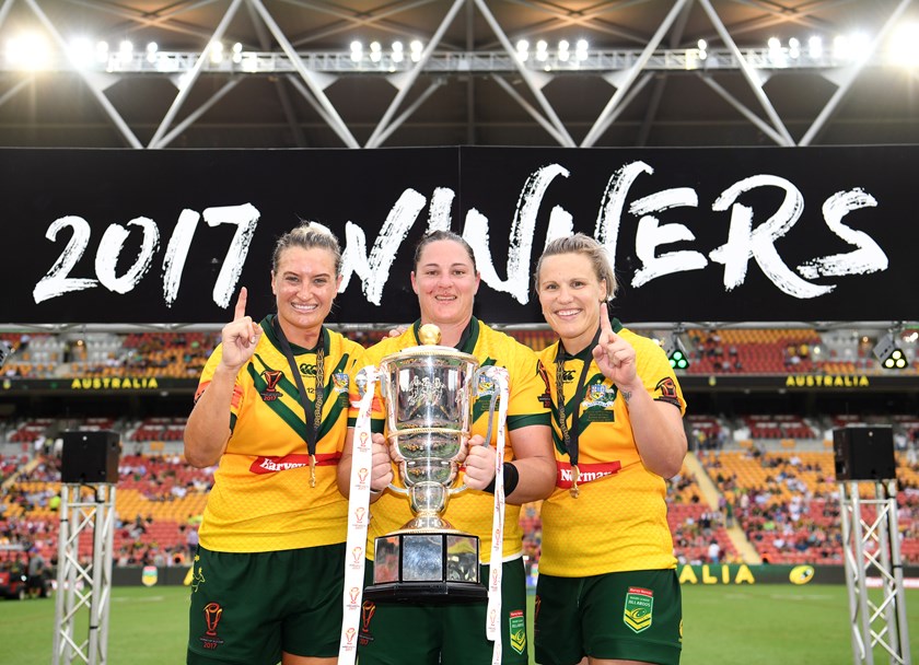 Retired forwards Ruan Sims and Renae Kunst with Steph Hancock after the Jillaroos won the World Cup in 2017.