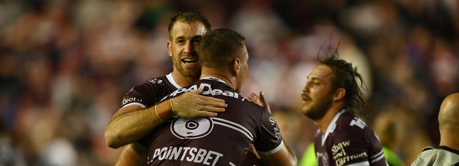 Manly back-rower Andrew Davey celebrates a try.
