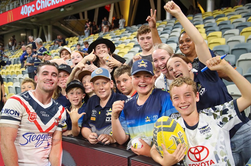 Connor Watson with a group of school children in Townsville
