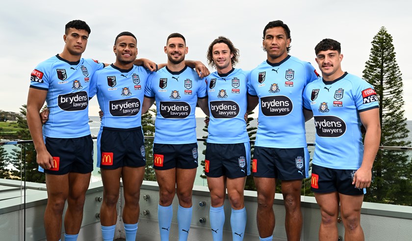 Stephen Crichton (second from the left) poses alongside the potential 2022 Origin debutants in Coogee on Monday.