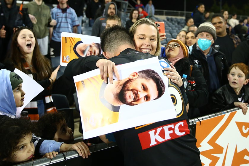 Tom Freebairn celebrates after making his NRL debut.