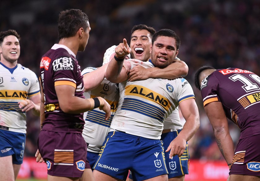 Eels forward Isaiah Papali'i celebrates a try against the Broncos.
