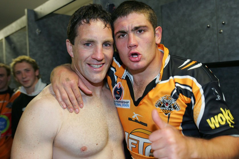 Chris Heighington and Mark O'Neill celebrate Wests Tigers' Premiership win in 2005.