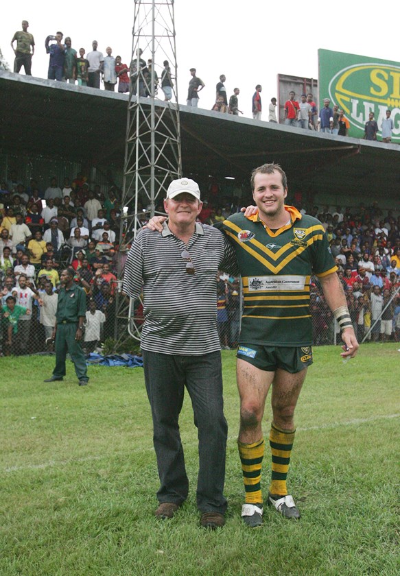 Clint Newton celebrates with dad Jack after the 2005 PM's XIII game against PNG in Port Moresby.
