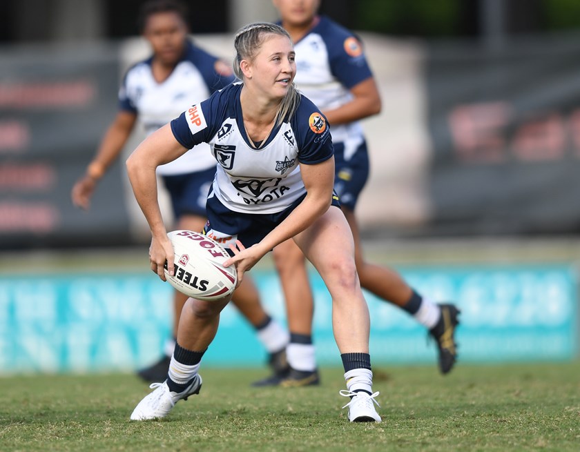 Emma Manzelmann has traded the swimsuit for a chance at playing in the NRLW.