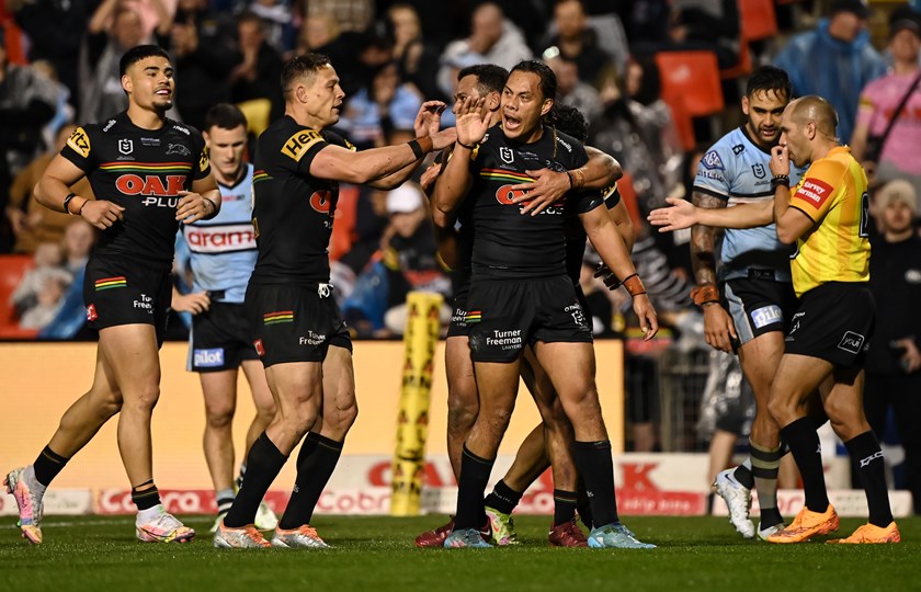 Luai celebrates after scoring the match sealing try against the Sharks