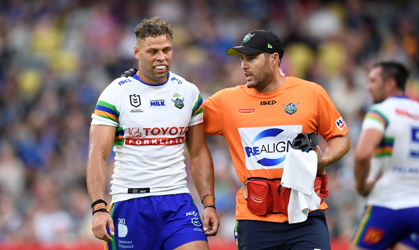 Raiders fullback Seb Kris is taken for a HIA