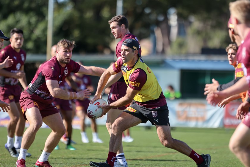 Maroons assistant coach Cameron Smith showing his dummy half skills at training