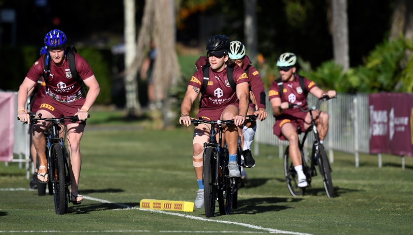 Maroons players ride bikes to training at their Sanctuary Cove camp