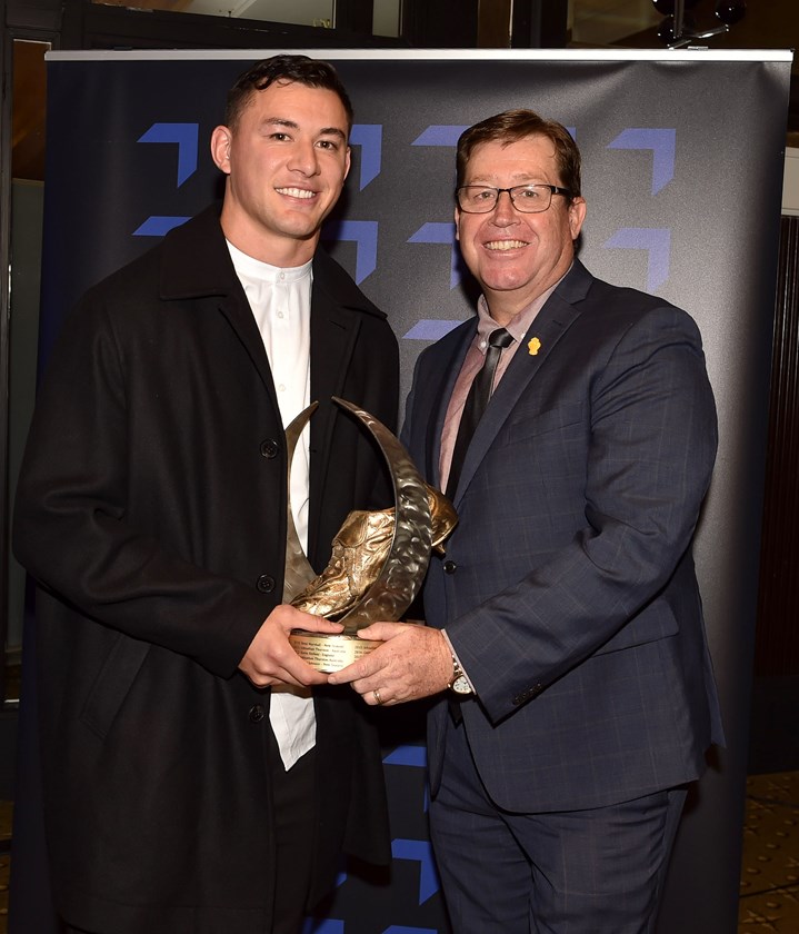 Joey Manu and IRL chair Troy Grant.