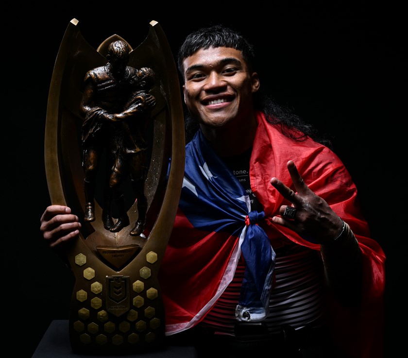 Brian To'o poses with the Provan-Summons Trophy and a Samoa flag after the grand final 