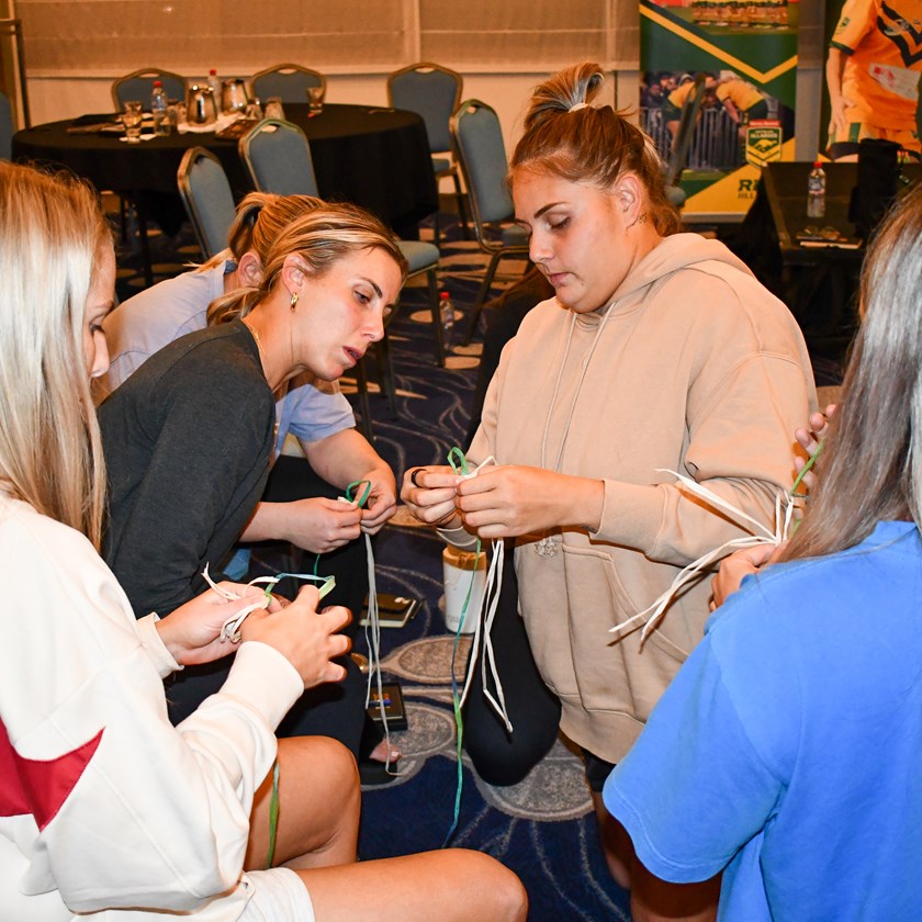 Sam Bremner gets some advice from Caitlan Johnston