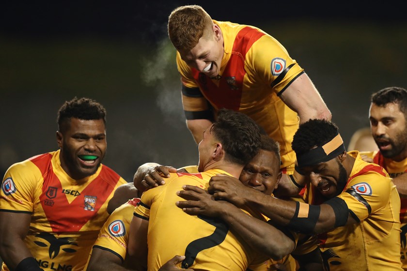 Kumuls players celebrate a Lachlan Lam try during the 2022 Pacific Test