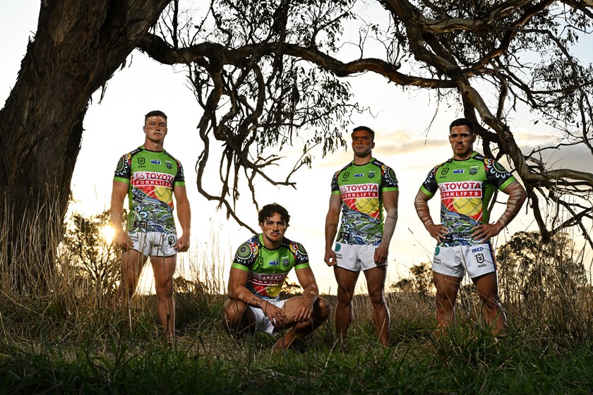 Raiders players Jack Wighton, Jamal Fogarty, Xavier Savage and Elijah Anderson pose in the Indigenous jersey they helped design in 2023.