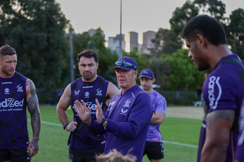 Storm coach Craig Bellamy at training with Tariq Sims and Jahrome Hughes.