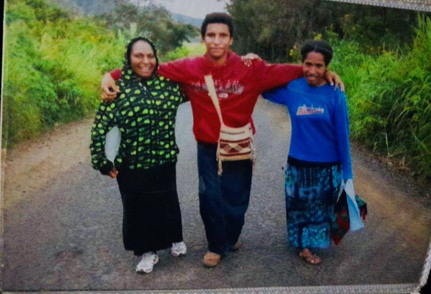 Albert as a teenager with her two aunties in Pangia, PNG.