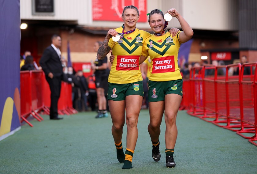 Keeley Davis (right) with Julia Robinson following the World Cup win at Old Trafford.