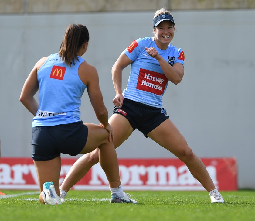 Emma Tonegato shares a laugh with Millie Boyle at training this week.