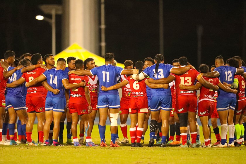 Tonga and Samoa players come together after their match on Tuesday.
