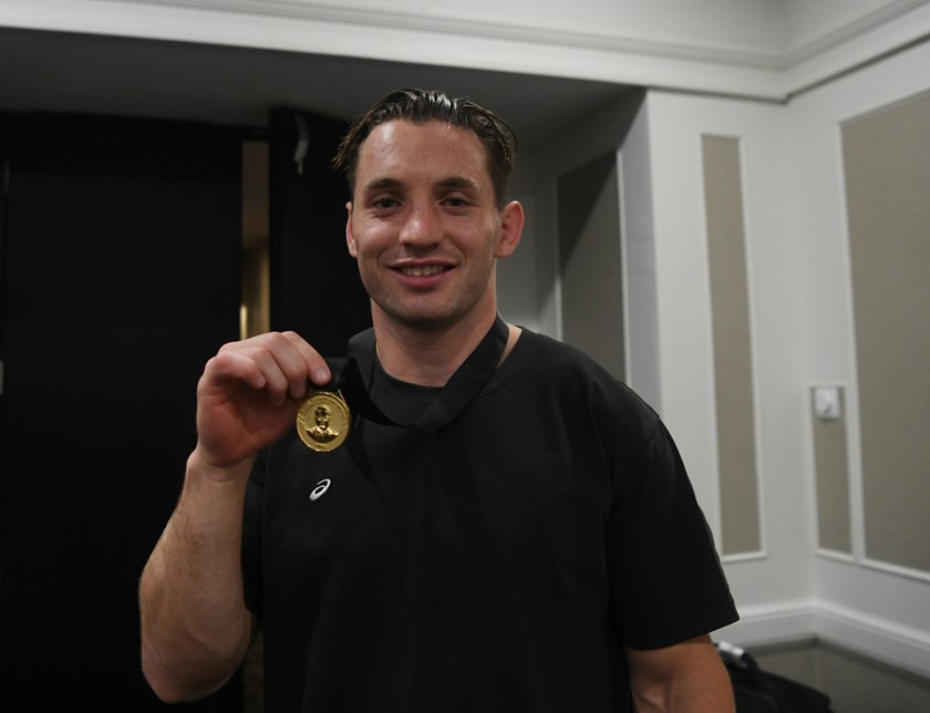 Cameron Murray proudly displays the Harry Sunderland Medal.