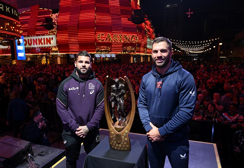 Broncos captain Adam Reynolds and Roosters counterpart James Tedesco with the Telstra Premiership trophy
