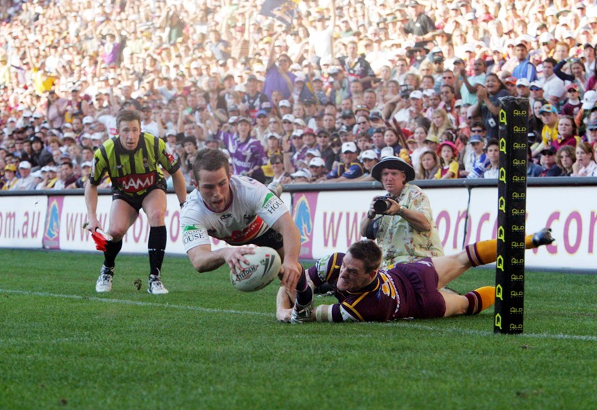 Steve Turner scores for the Storm in an 18-12 win over the Broncos in Round 23, 2006.