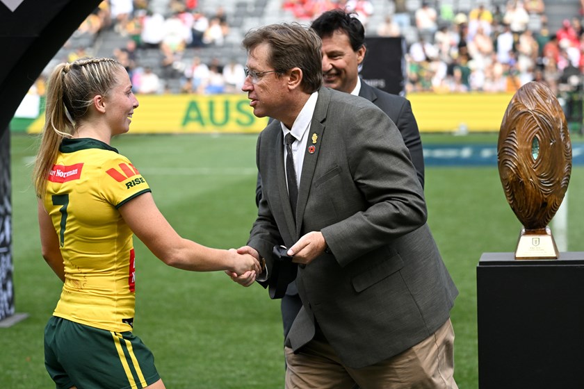 Jillaroos halfback Tarryn Aiken receives the player of the match medal from IRL Chair Troy Grant after the Pacific Cup final.