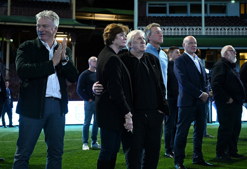 Karen and Steve Mortimer watch a video Michael Maguire had prepared on the big screen at the SCG.