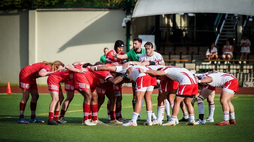 Singapore halfback Tylan Berryman feeds a scrum against Japan.