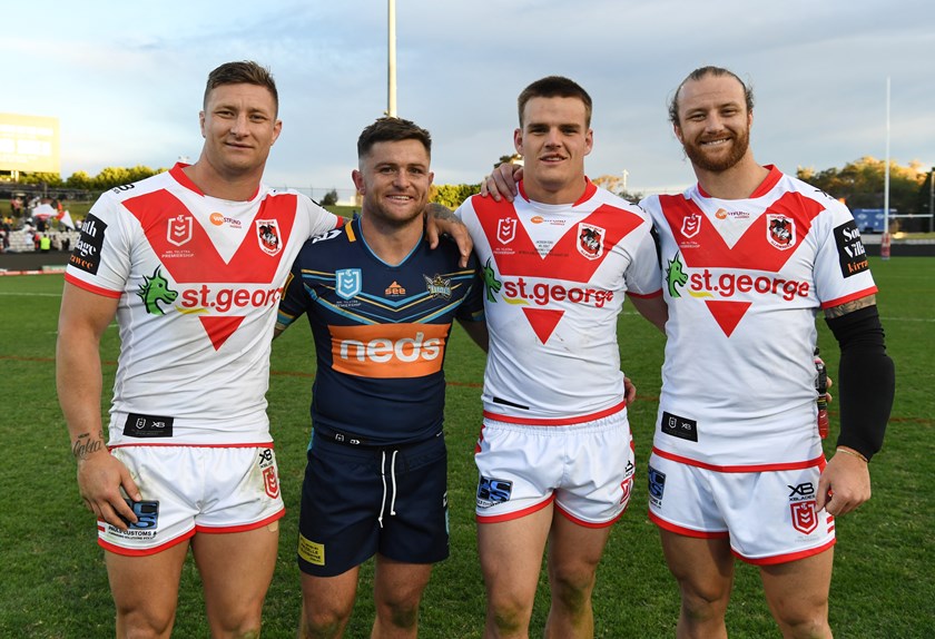 Gerringong's Tariq Sims, Jackson Ford and Korbin Sims with Kiama junior Mitch Rein after a 2019 Dragons-Titans match.