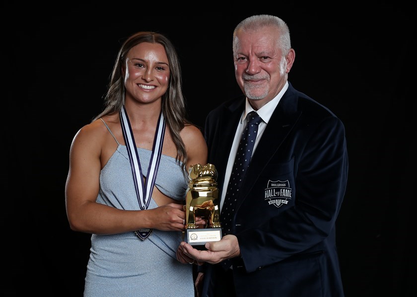 Andie Robinson received the inaugural Bulldogs NRLW Player of the Year award from club great Dr George Peponis.