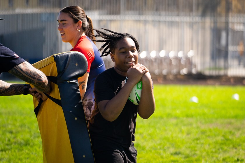 LA Roosters female and male players ran the coaching clinic at Watts, which is home to one of the US's biggest housing projects.