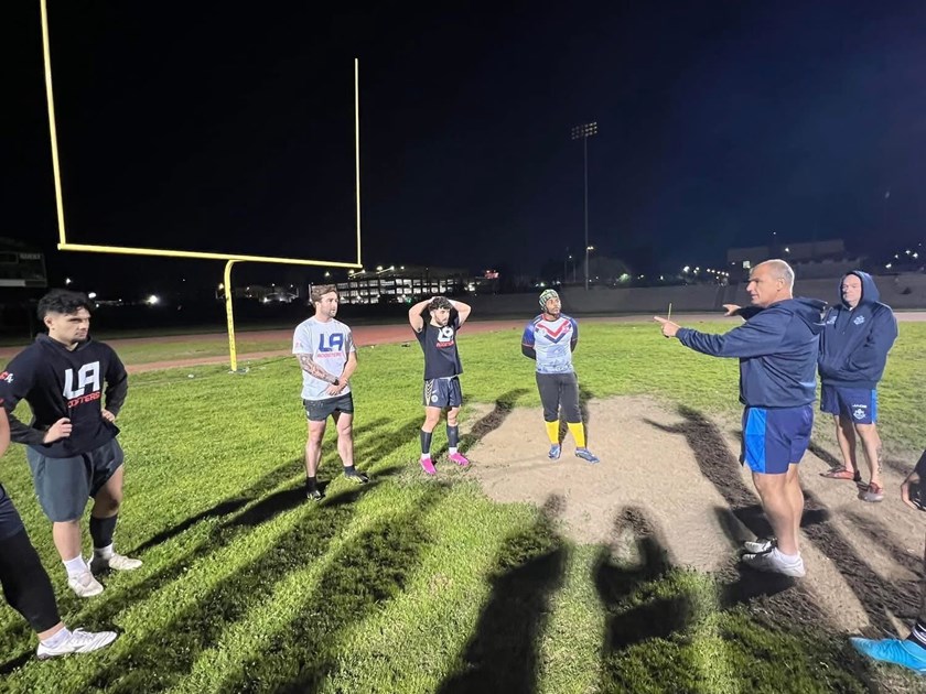 Greek coach Steve Georgallis with LA Roosters players at a joint training session.
