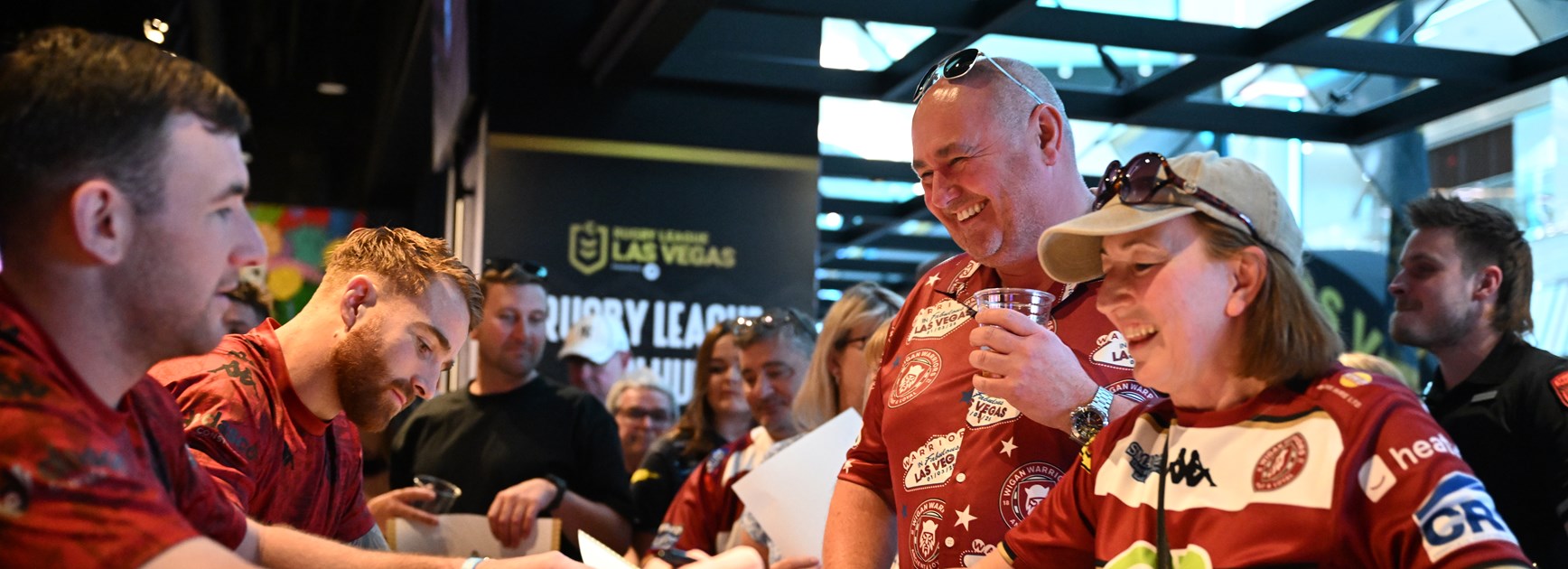 Wigan fans paint Fremont Street cherry and white